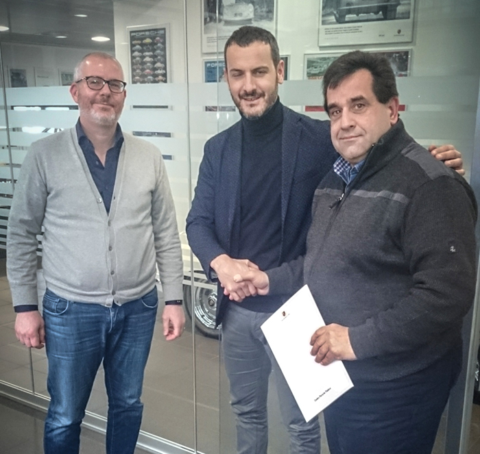From left: Stefano Bacchin, Used Cars and Motorsport Responsible at Centro Porsche Padova with Porsche Italia CFO & Centro Porsche Padova CEO Luca Baldin and Tsunami RT Team Manager Stelios Fakalis right after the signing of the agreement between Centro Porsche Padova and Tsunami RT